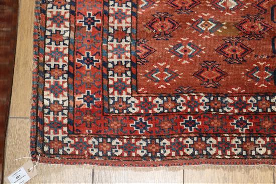 A Tekke style red ground rug 164 x 130cm